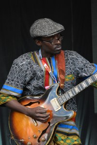 Cheikh Lô Band at WOMAD UK 2015, photo by Dylan Garcia
